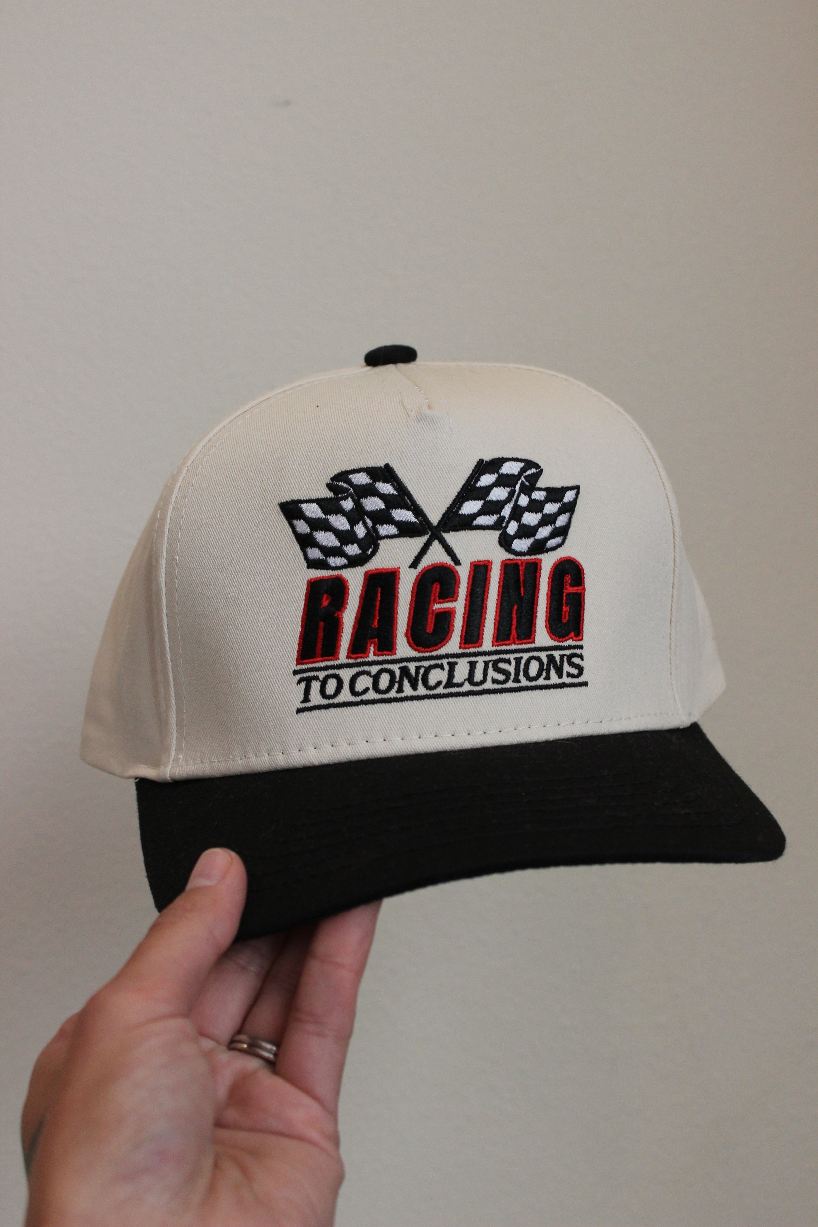 Racing To Conclusions Trucker Hat