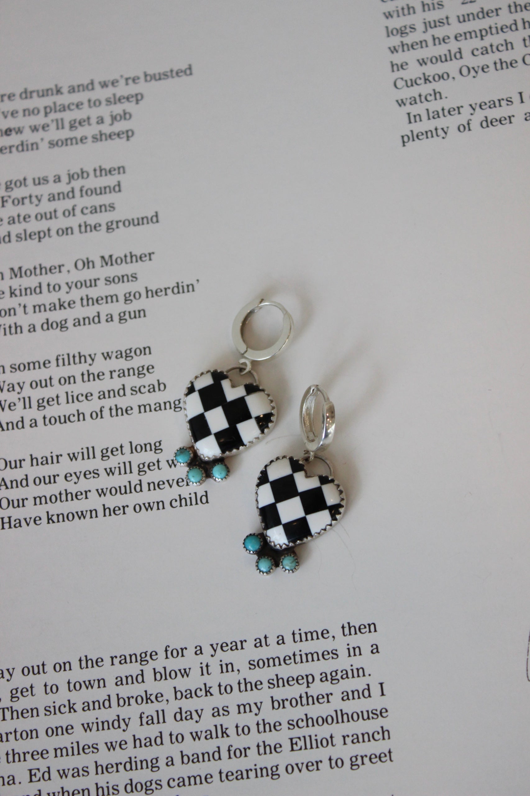 Checkered Turq Heart Huggies